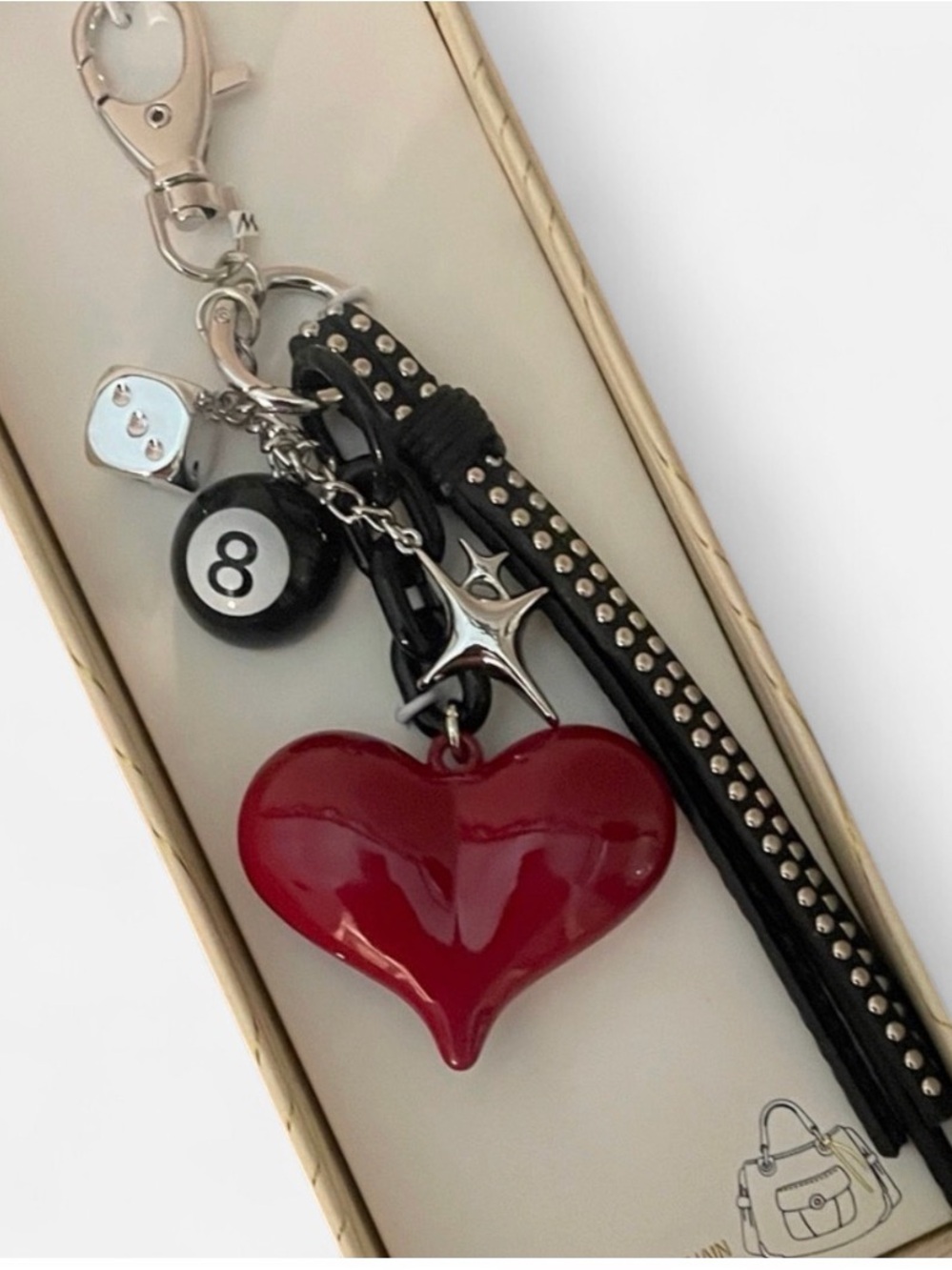 Studded Black Tassel Keychain with Red Heart Charm by Eye Candy